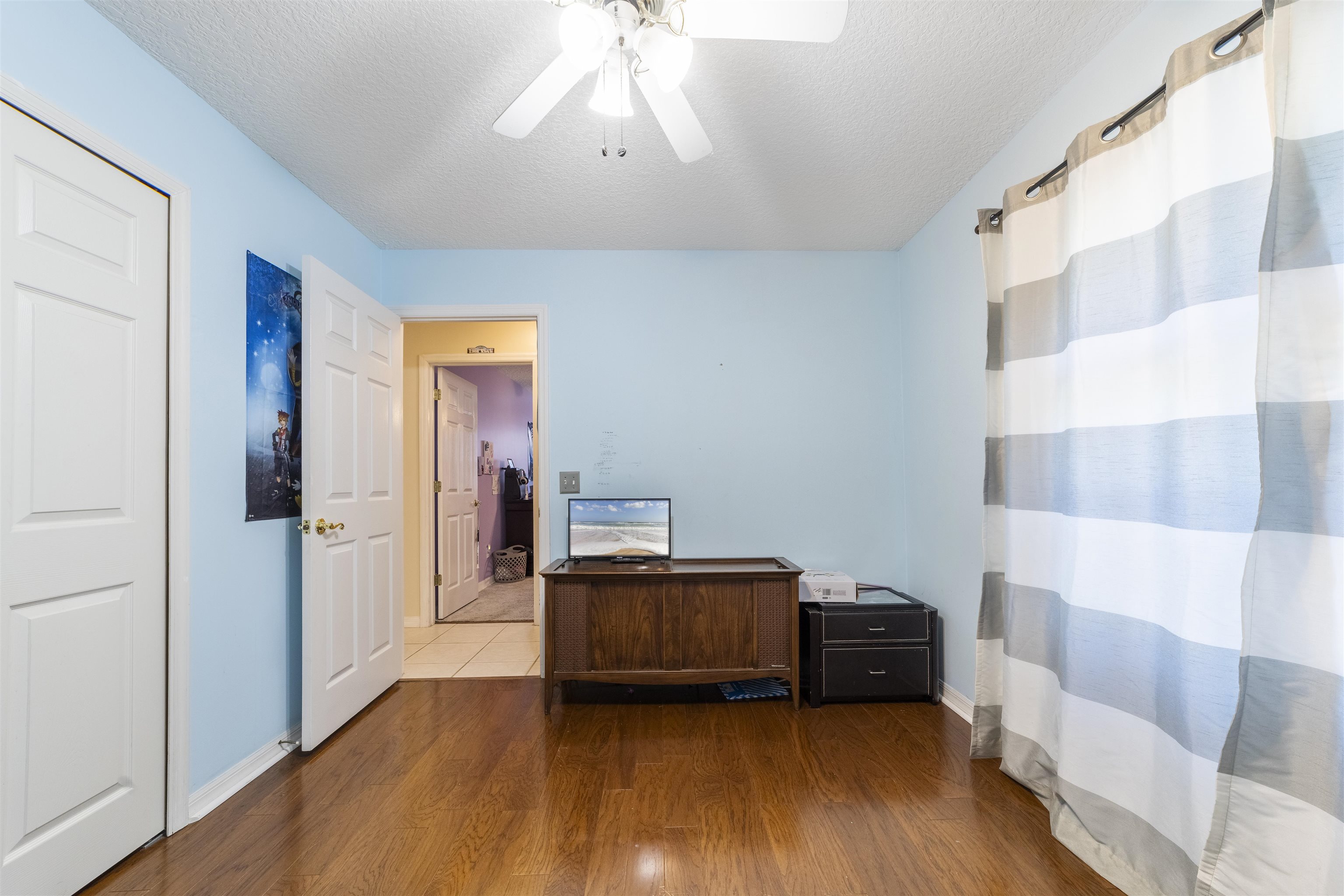 311 Graciela Circle St. Augustine, FL 32086 - Photo 54 of 65 Office space featuring wood finished floors, a textured ceiling, and ceiling fan