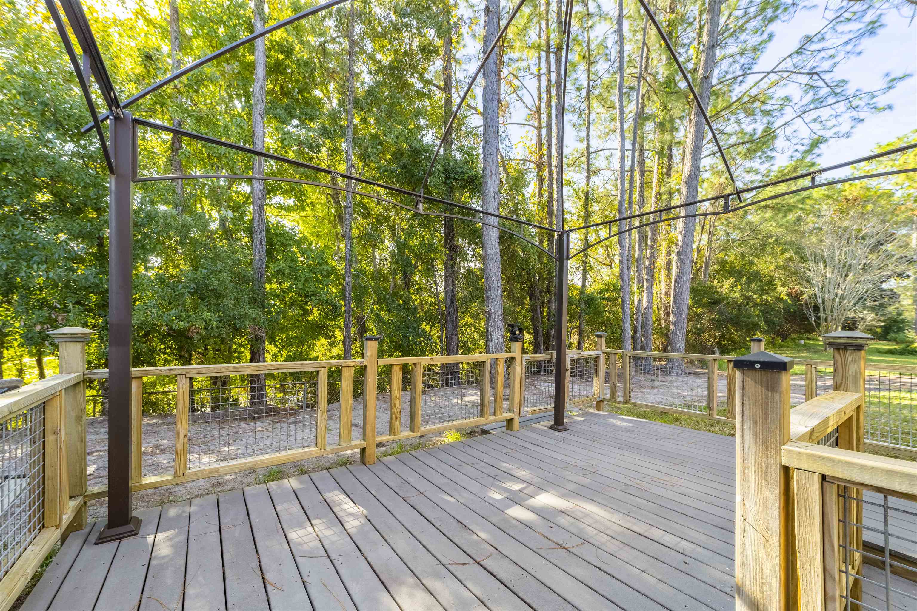 311 Graciela Circle St. Augustine, FL 32086 - Photo 56 of 65 Wooden deck with view of scattered trees