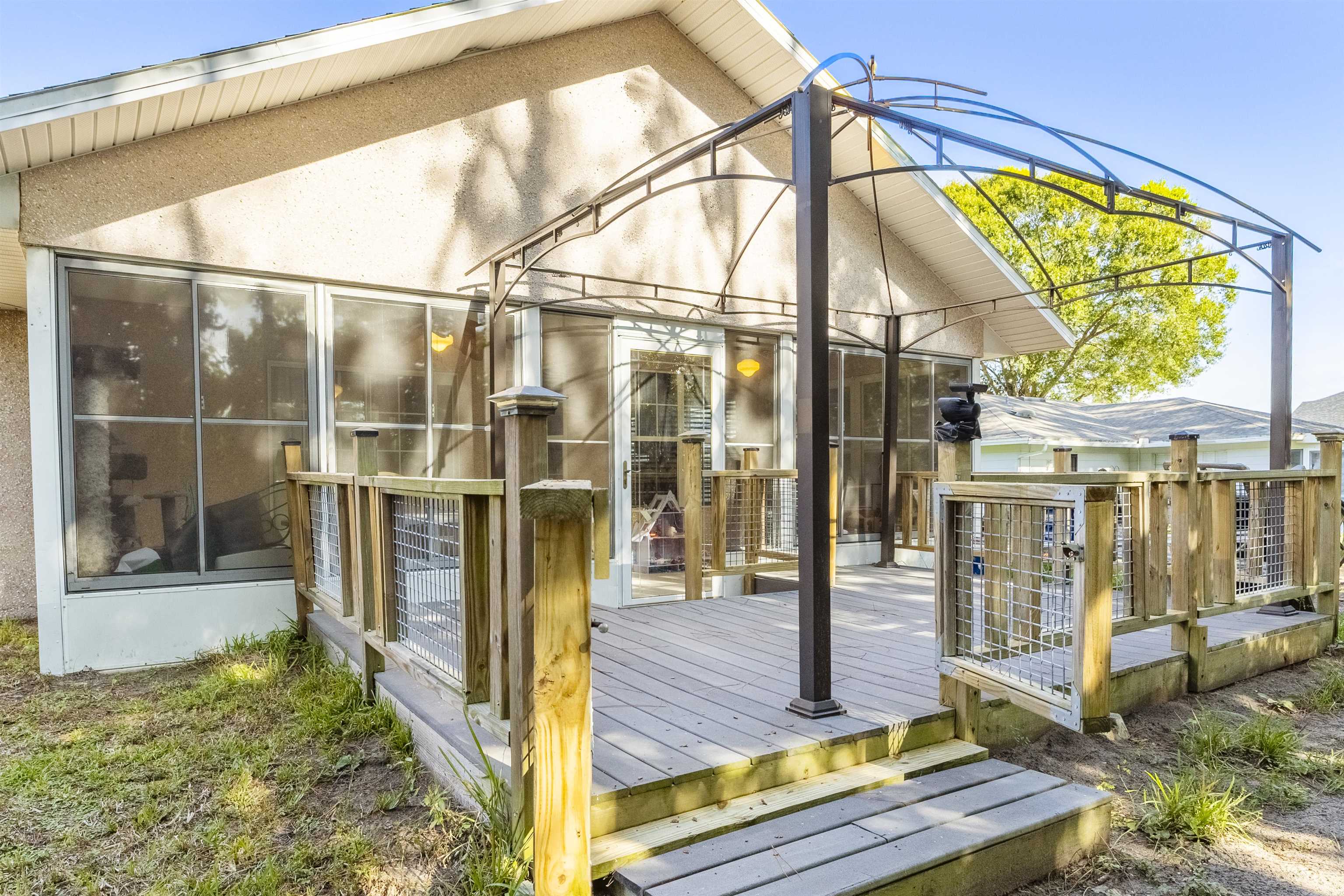 311 Graciela Circle St. Augustine, FL 32086 - Photo 57 of 65 Deck with a sunroom