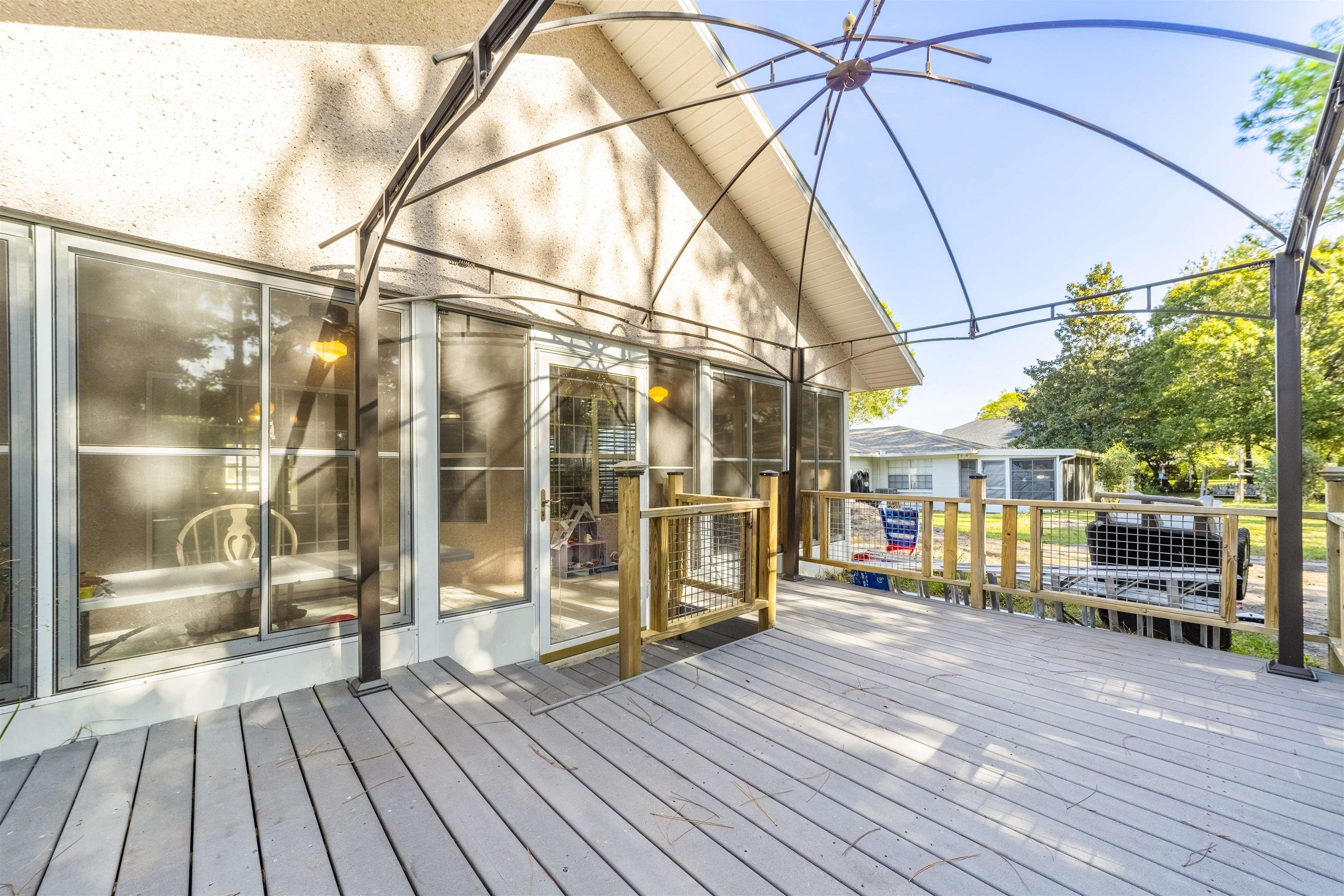311 Graciela Circle St. Augustine, FL 32086 - Photo 58 of 65 Wooden terrace with a sunroom