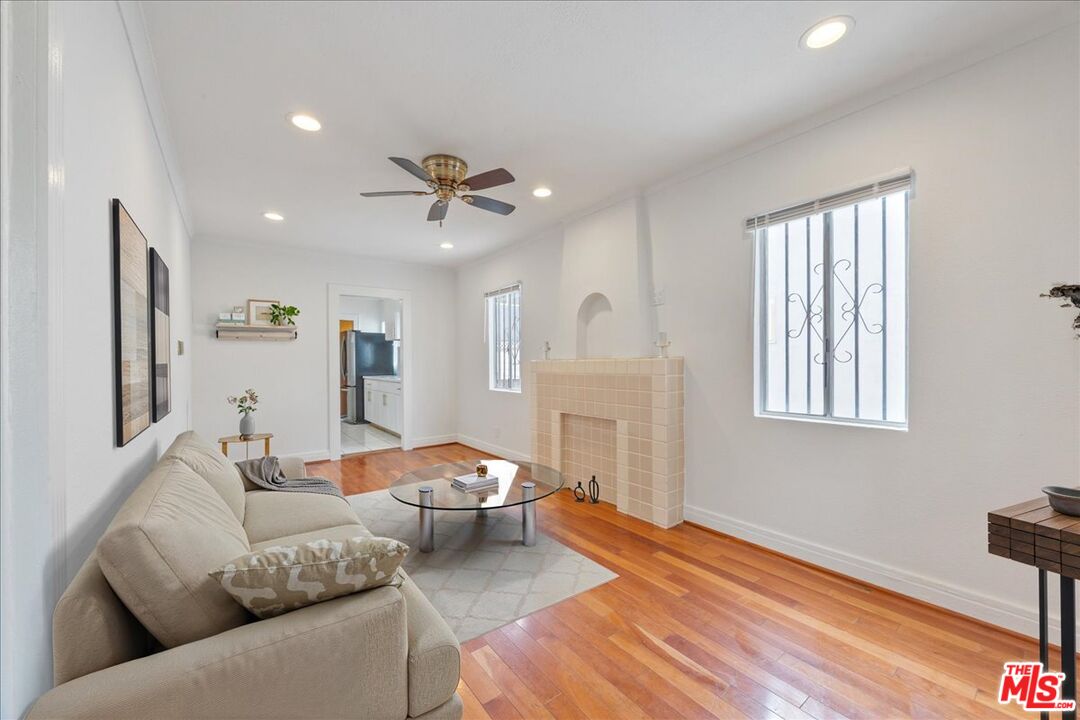 2840 South Mansfield Avenue Los Angeles, CA 90016 - Photo 5 of 50 a living room with furniture and a window