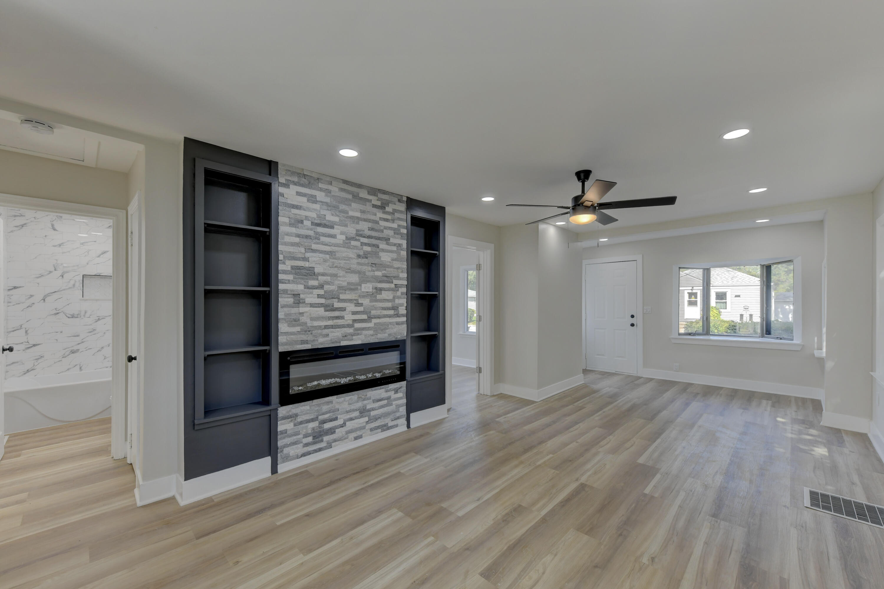 824 Elm Street Valparaiso, IN 46383 - Photo 5 of 20 wooden floor in an empty room with a window
