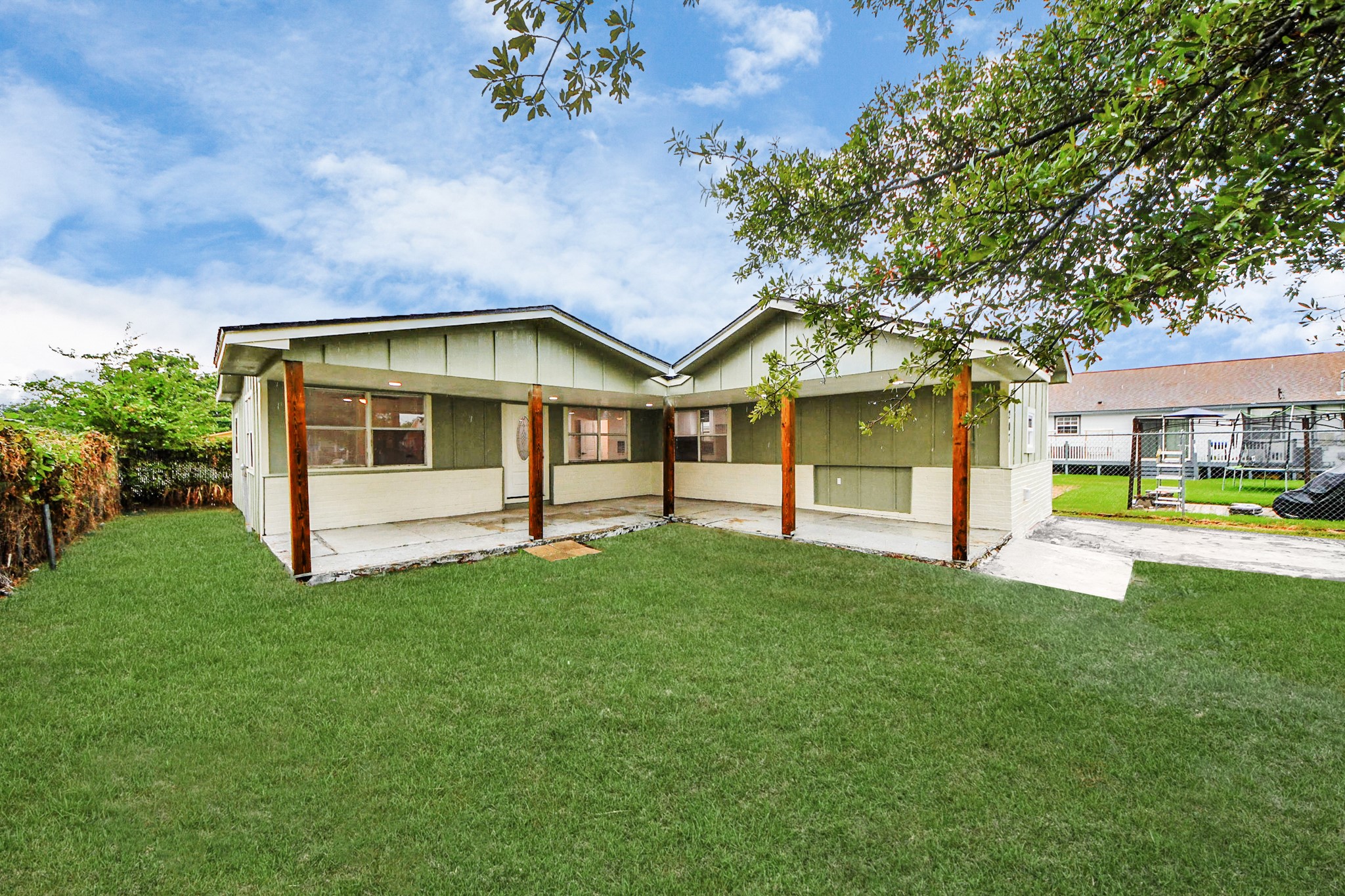 207 East Defee Avenue Baytown, TX 77520 - Photo 3 of 36 a view of a house with a yard porch and sitting area