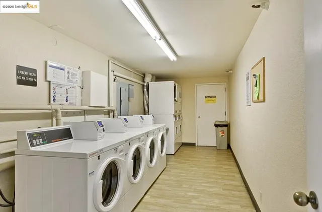 a view of backyard with swimming pool and seating area