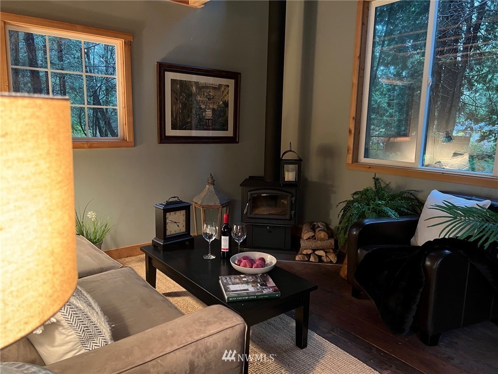 462 Moose Trail Point Roberts, WA 98281 - Photo 12 of 17 a living room with furniture and a floor to ceiling window