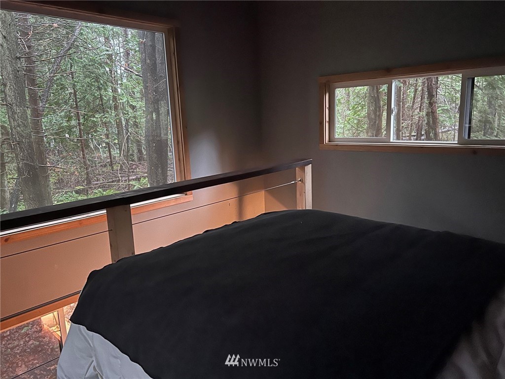 462 Moose Trail Point Roberts, WA 98281 - Photo 6 of 17 a black chair sitting in front of a window