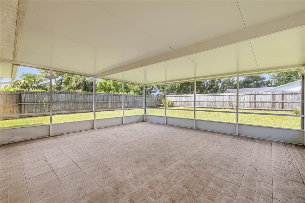 2416 Pine Tree Drive Edgewater, FL 32141 - Photo 38 of 50 a view of a backyard