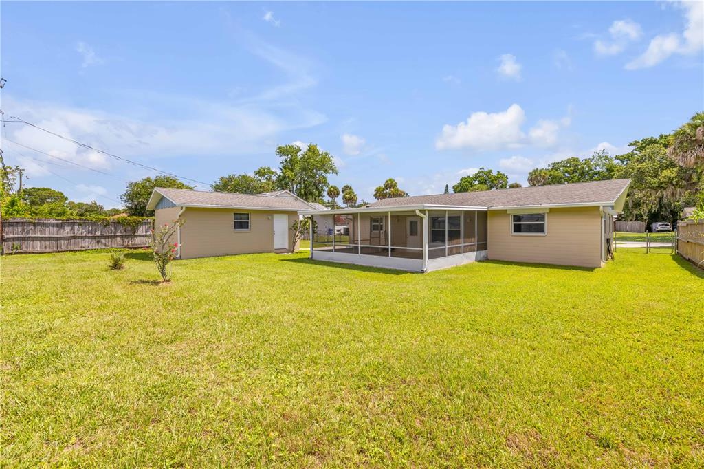 2416 Pine Tree Drive Edgewater, FL 32141 - Photo 45 of 50 a front view of house with ocean view