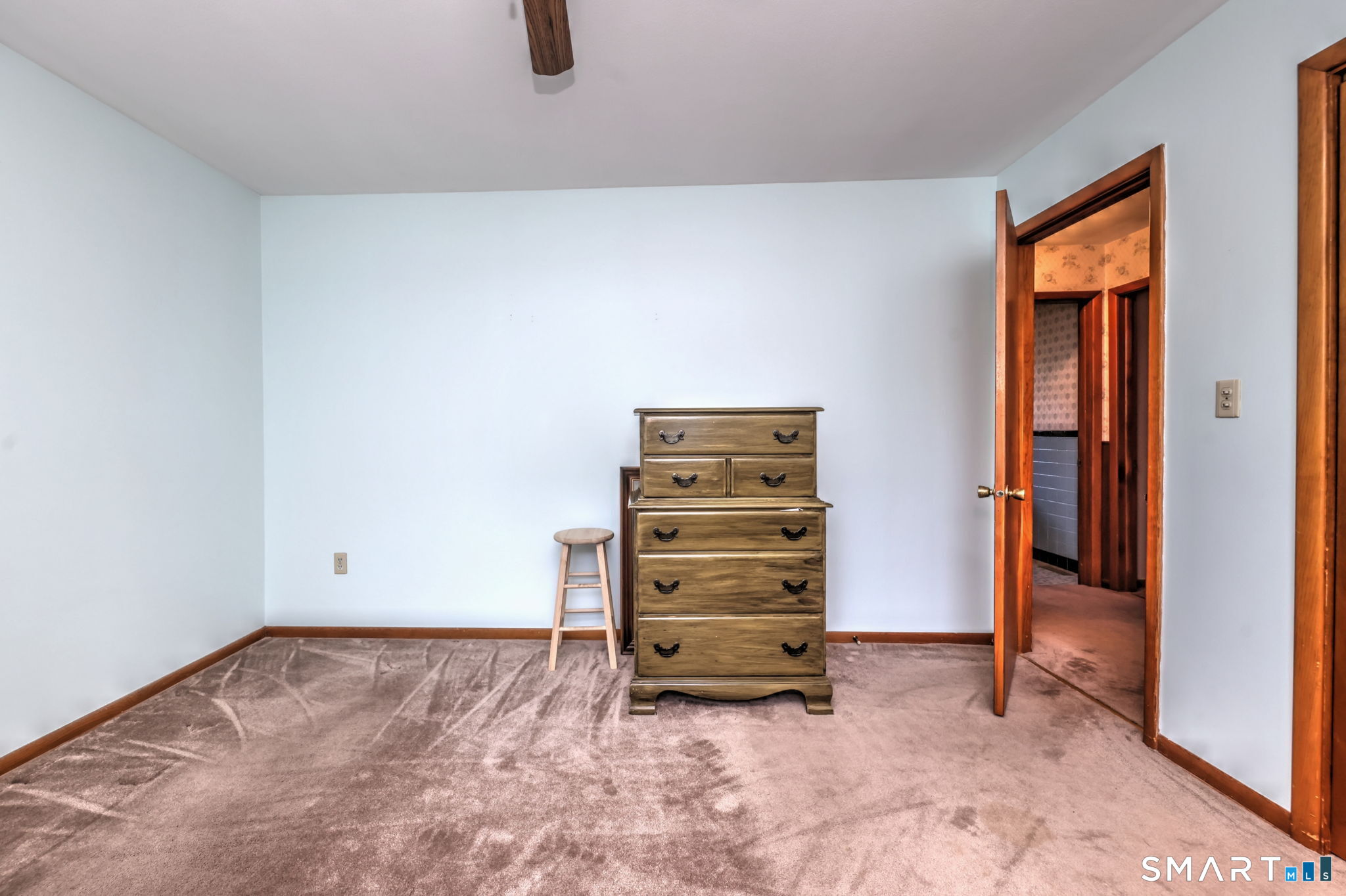 212 Swain Avenue Meriden, CT 06450 - Photo 23 of 38 a view of walk in closet with clothes