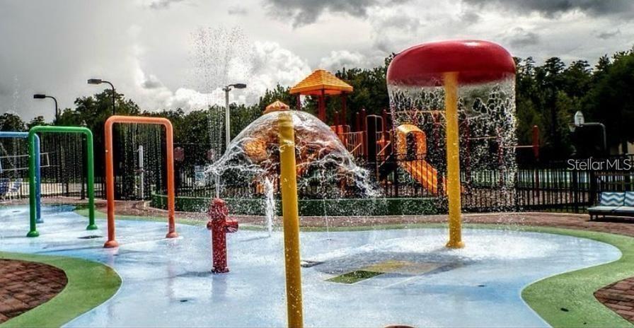4600 Yellowgold Road West, Unit 106 Kissimmee, FL 34746 - Photo 14 of 25 a front view of a house with yard and entertaining space