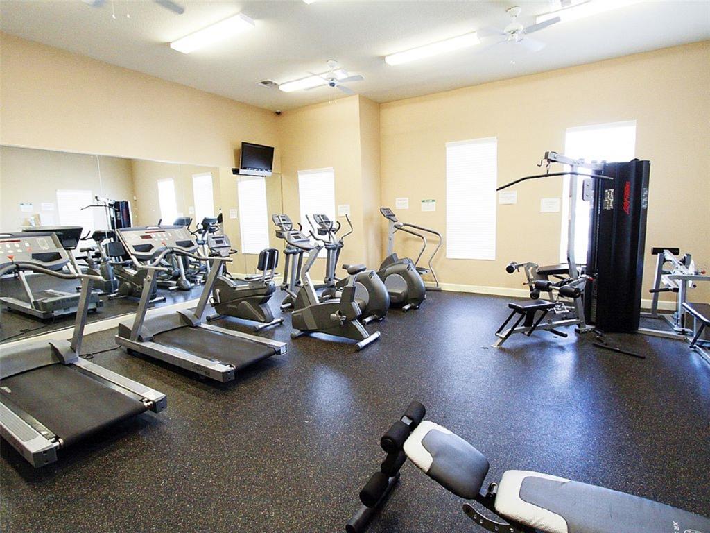 4600 Yellowgold Road West, Unit 106 Kissimmee, FL 34746 - Photo 15 of 25 a view of a room with gym equipment