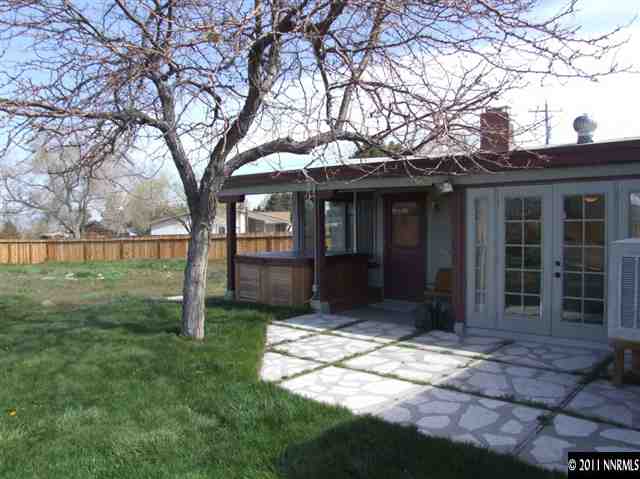 15165 Kivett Lane Reno, NV 89521 - Photo 12 of 12 a front view of a house with garden