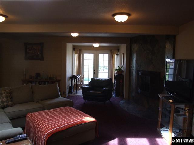 15165 Kivett Lane Reno, NV 89521 - Photo 4 of 12 a living room with furniture and a window