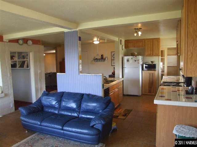 15165 Kivett Lane Reno, NV 89521 - Photo 6 of 12 a living room with furniture and kitchen view