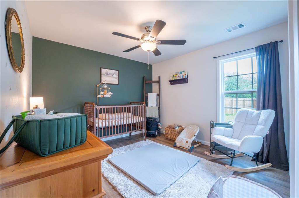 118 Wash Rider Road Dahlonega, GA 30533 - Photo 10 of 37 a bedroom with furniture and a window