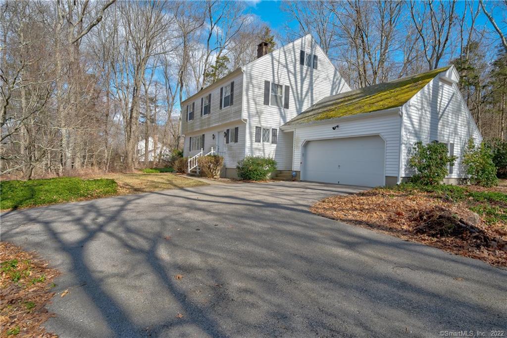 56 Church Hill Road Ledyard, CT 06339 - Photo 1 of 1 a front view of a house with a yard