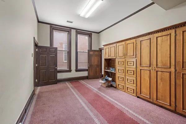 a view of livingroom with hardwood floor and hallway