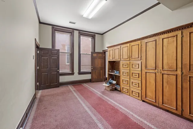 a view of livingroom with hardwood floor and hallway