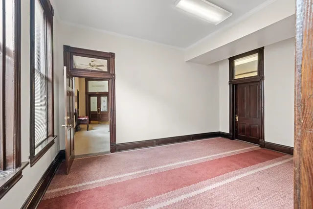 an empty room with windows