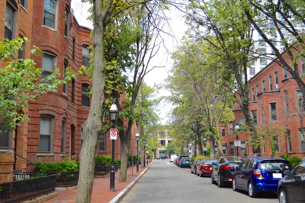 67 St Germain Street, Unit 191 Boston, MA 02115 - Photo 1 of 13 a view of a building and car parked on the side of road