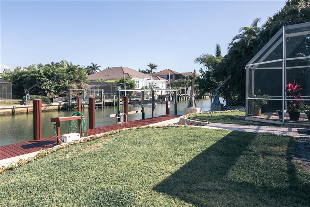 2155 Tarpon Road Naples, FL 34102 - Photo 12 of 27 a view of a garden