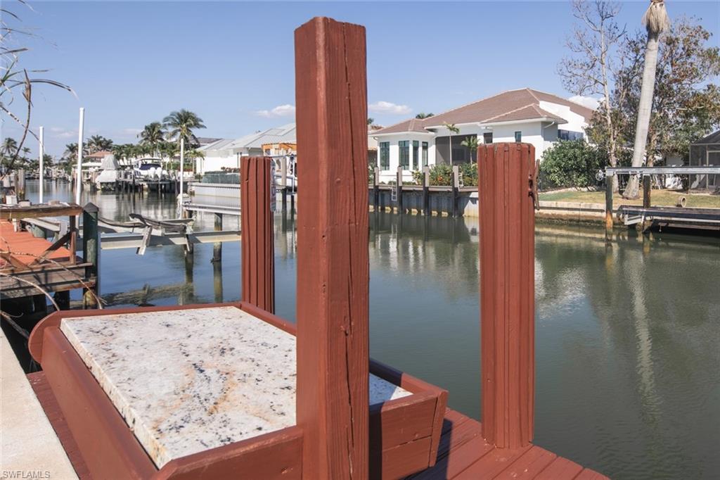 2155 Tarpon Road Naples, FL 34102 - Photo 24 of 27 a view of a terrace with chairs