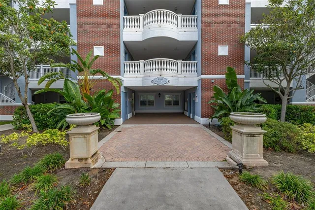 a bedroom with a bed and a cabinets