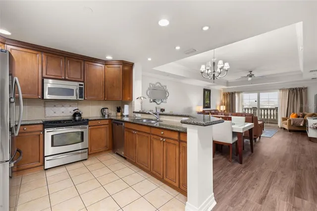 a living room with furniture and a lamp