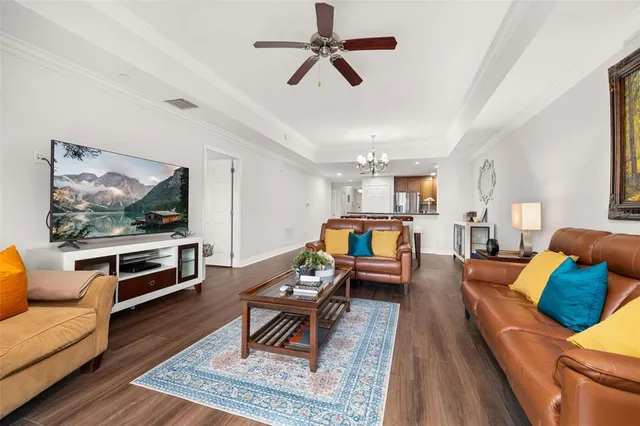 a view of a hallway view with wooden floor and staircase