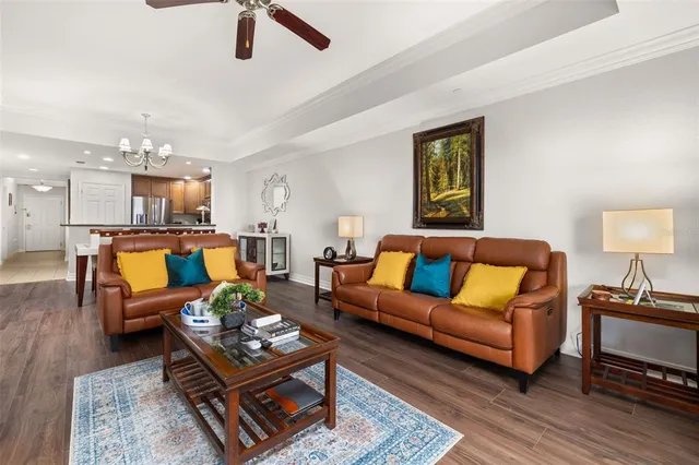 a spacious bathroom with a tub sink and mirror