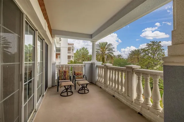 a view of a pathway with a wooden fence