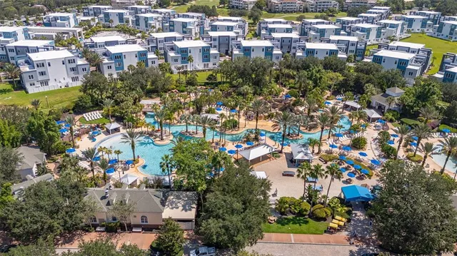a view of a patio with a table and chairs