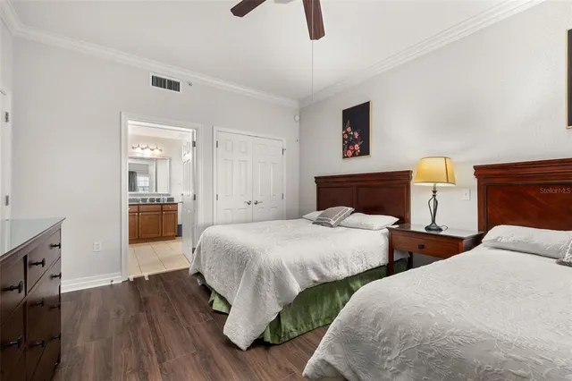 a kitchen with stainless steel appliances granite countertop a refrigerator sink and stove