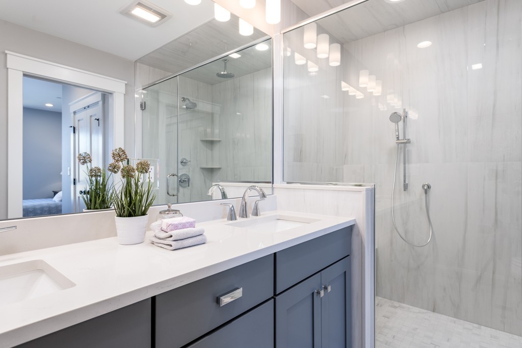 227 Cedar Street, Unit 6 Somerville, MA 02145 - Photo 12 of 25 a bathroom with a double vanity sink mirror and shower