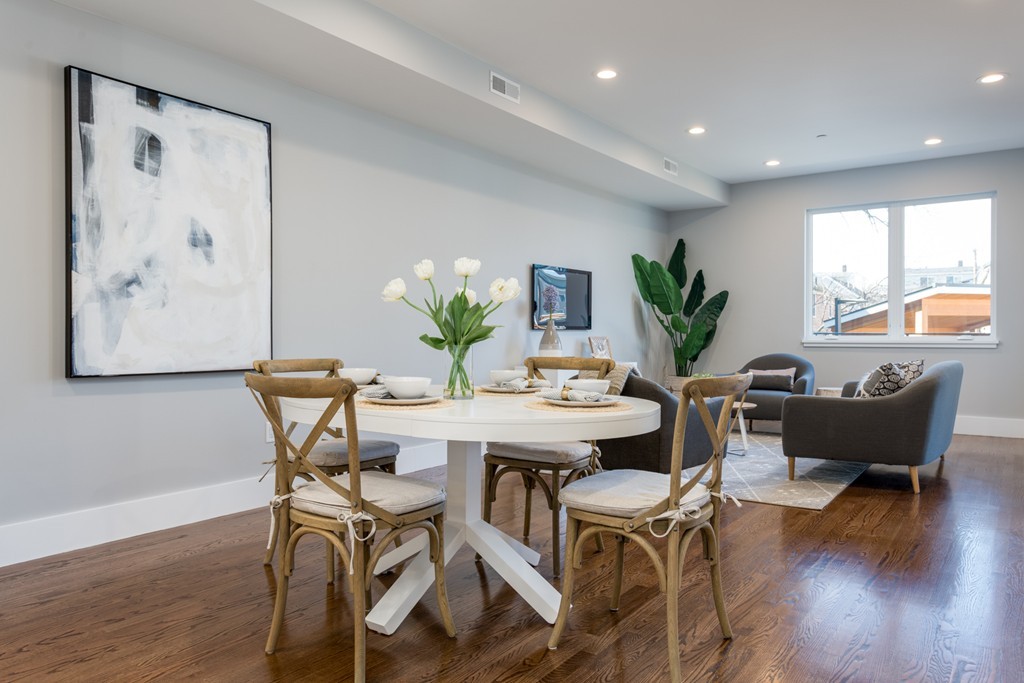 227 Cedar Street, Unit 6 Somerville, MA 02145 - Photo 9 of 25 a view of a dining room with furniture window and wooden floor