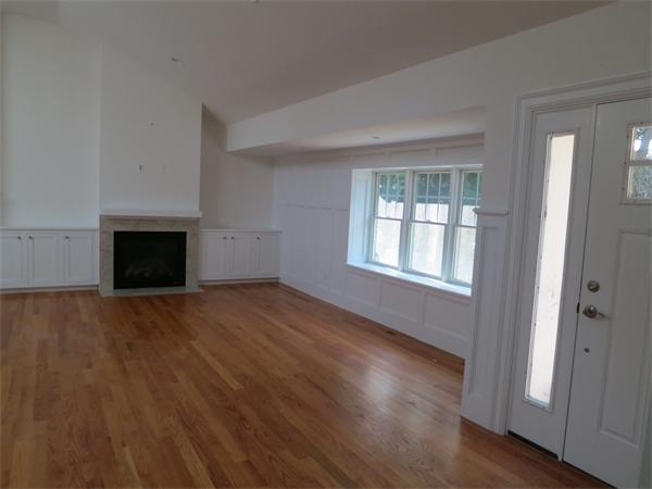 9 Blueberry Road Marblehead, MA 01945 - Photo 2 of 13 an empty room with wooden floor and windows