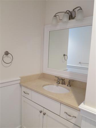 9 Blueberry Road Marblehead, MA 01945 - Photo 9 of 13 a bathroom with a sink and a mirror