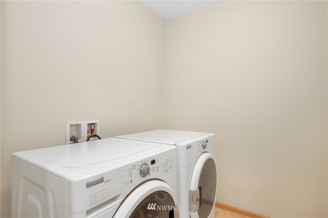 4408 Northeast 3rd Lane Renton, WA 98059 - Photo 20 of 25 a utility room with dryer and washer