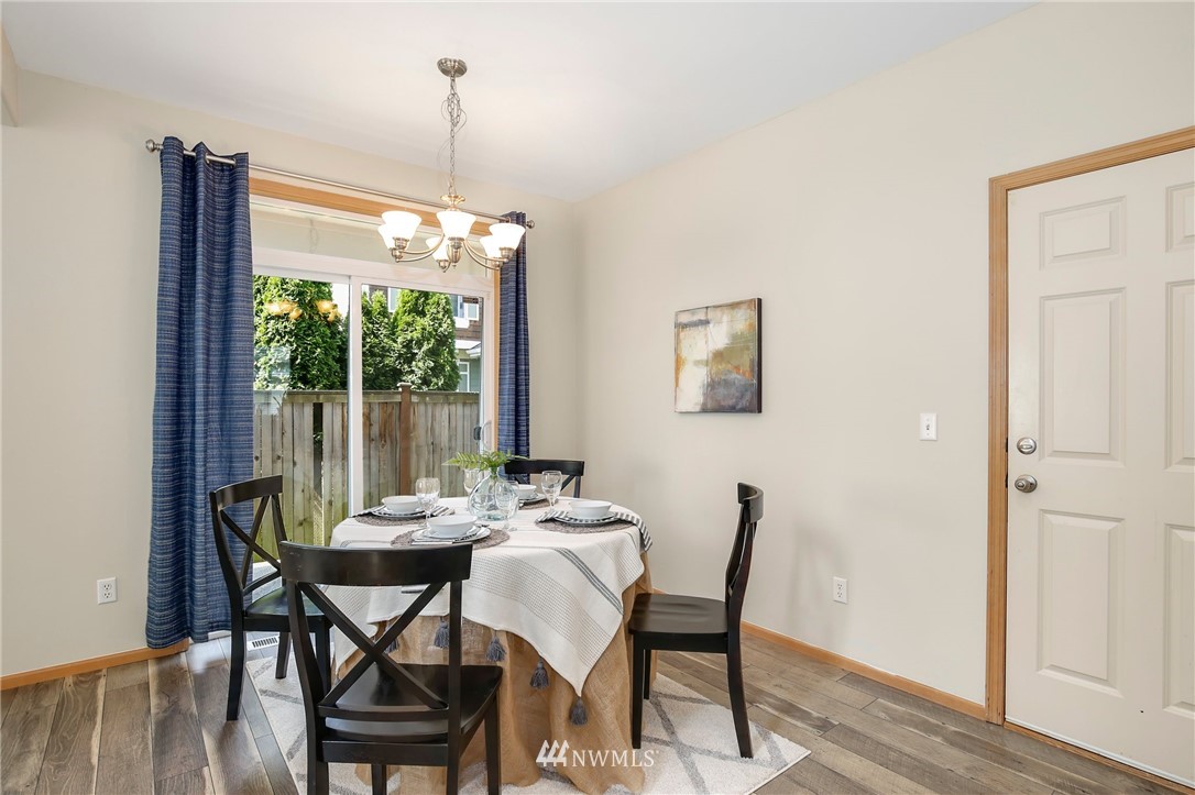 4408 Northeast 3rd Lane Renton, WA 98059 - Photo 6 of 25 a view of a dining room with furniture window and outside view