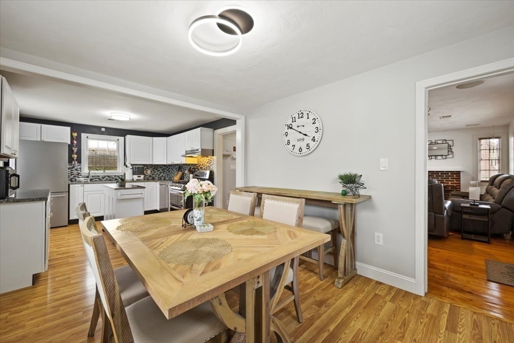 4 Webster Street Randolph, MA 02368 - Photo 22 of 32 a dining room with furniture and wooden floor