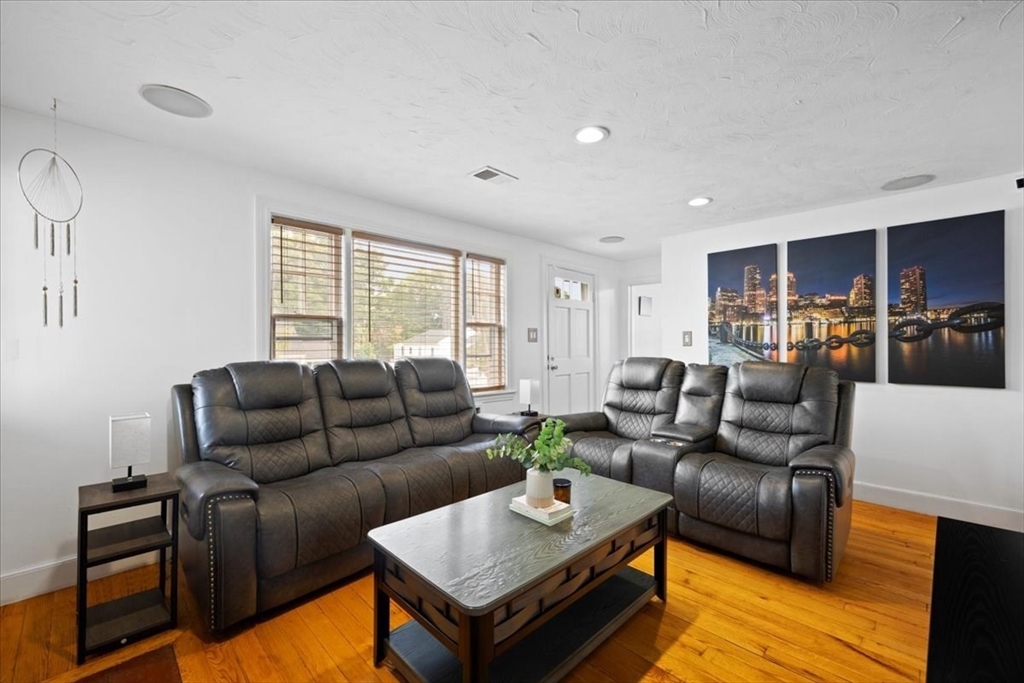 4 Webster Street Randolph, MA 02368 - Photo 5 of 32 a living room with furniture and a window
