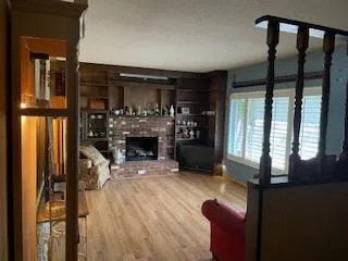 a view of a entryway with furniture and floor to ceiling window