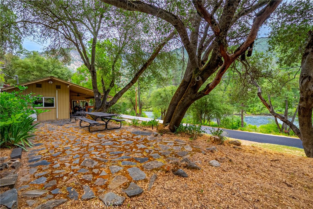 9977 Incline Road El Portal, CA 95318 - Photo 12 of 46 a view of a backyard with a bench