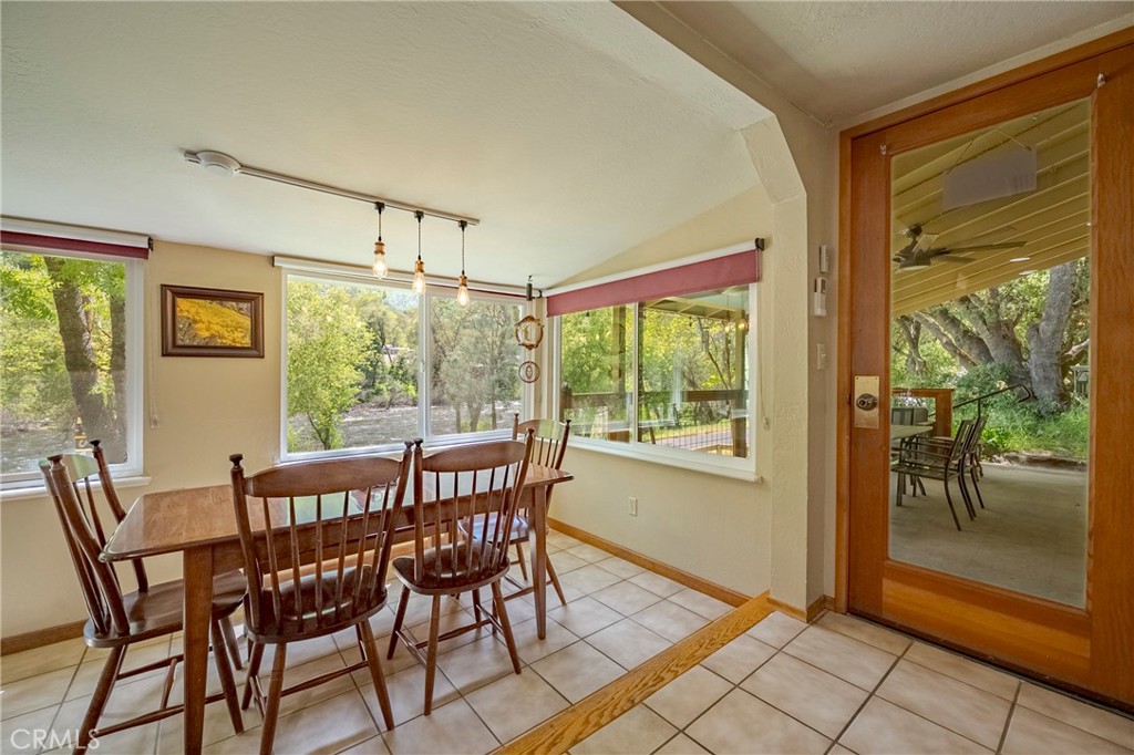 9977 Incline Road El Portal, CA 95318 - Photo 23 of 46 a view of a dining room with furniture window and outside view
