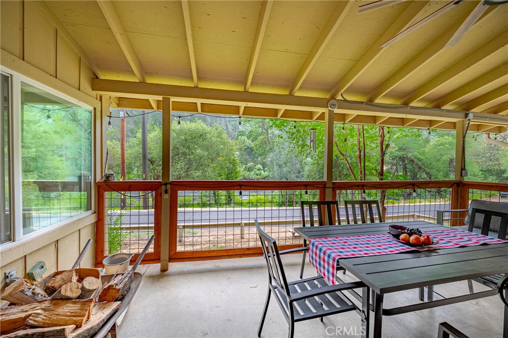 9977 Incline Road El Portal, CA 95318 - Photo 10 of 46 a room with furniture and a table