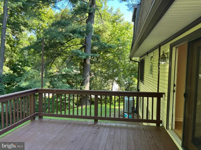 a view of a wooden roof deck