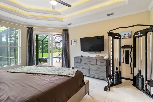 a view of a swimming pool with a table and chairs