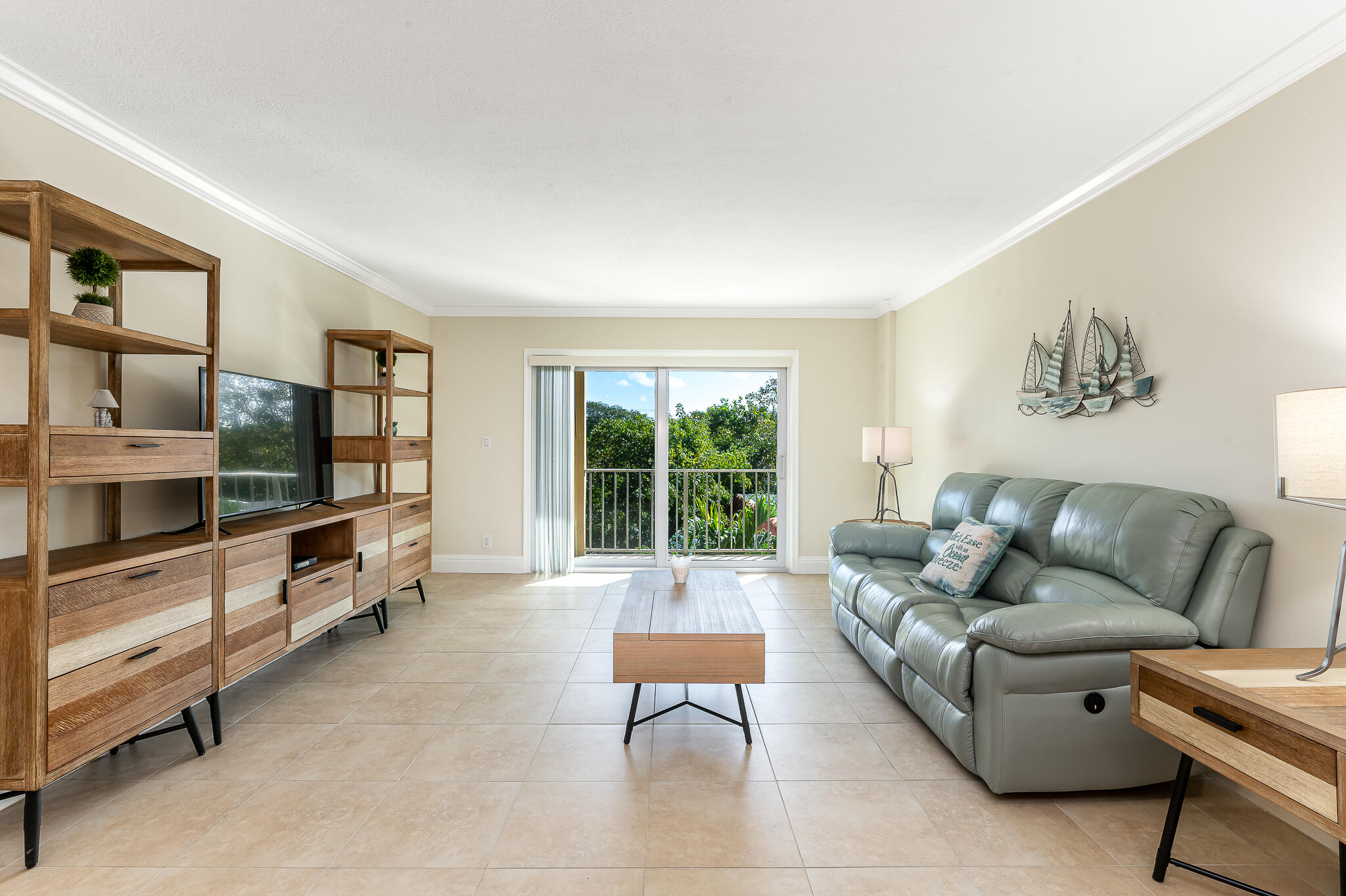 1111 South Ocean Boulevard, Unit 320 Boca Raton, FL 33432 - Photo 6 of 24 Living Area w/ Balcony