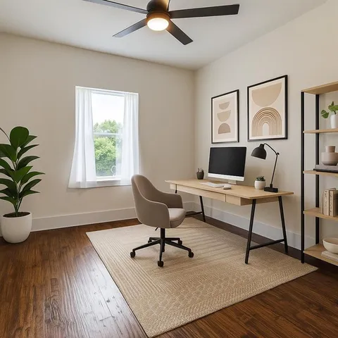 a workspace with furniture and a window