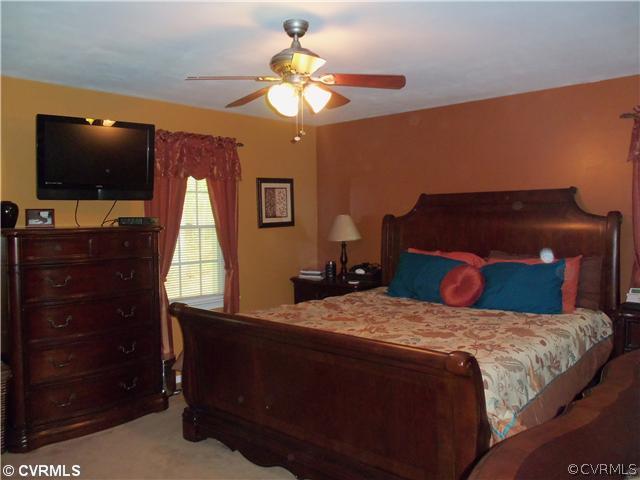2565 Pilkington Road Powhatan, VA 23139 - Photo 6 of 12 Master Bedroom - first floor master bedroom with d